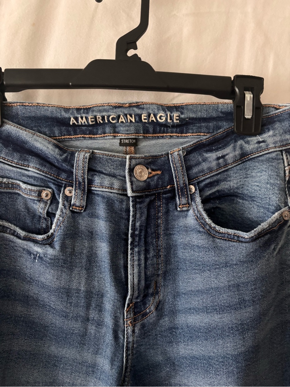 American Eagle Outfitters Light Blue Denim Jeans with Orange Stitching